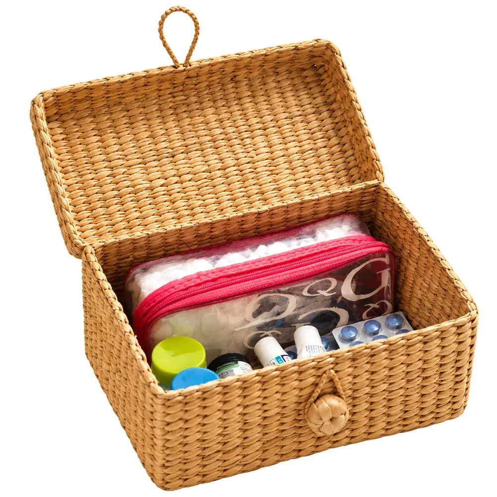 Natural kauna grass storage basket with lid, woven grass handle and loop-and-button closure
